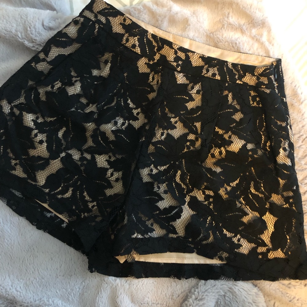 LUSH tan and black high waisted lace shorts